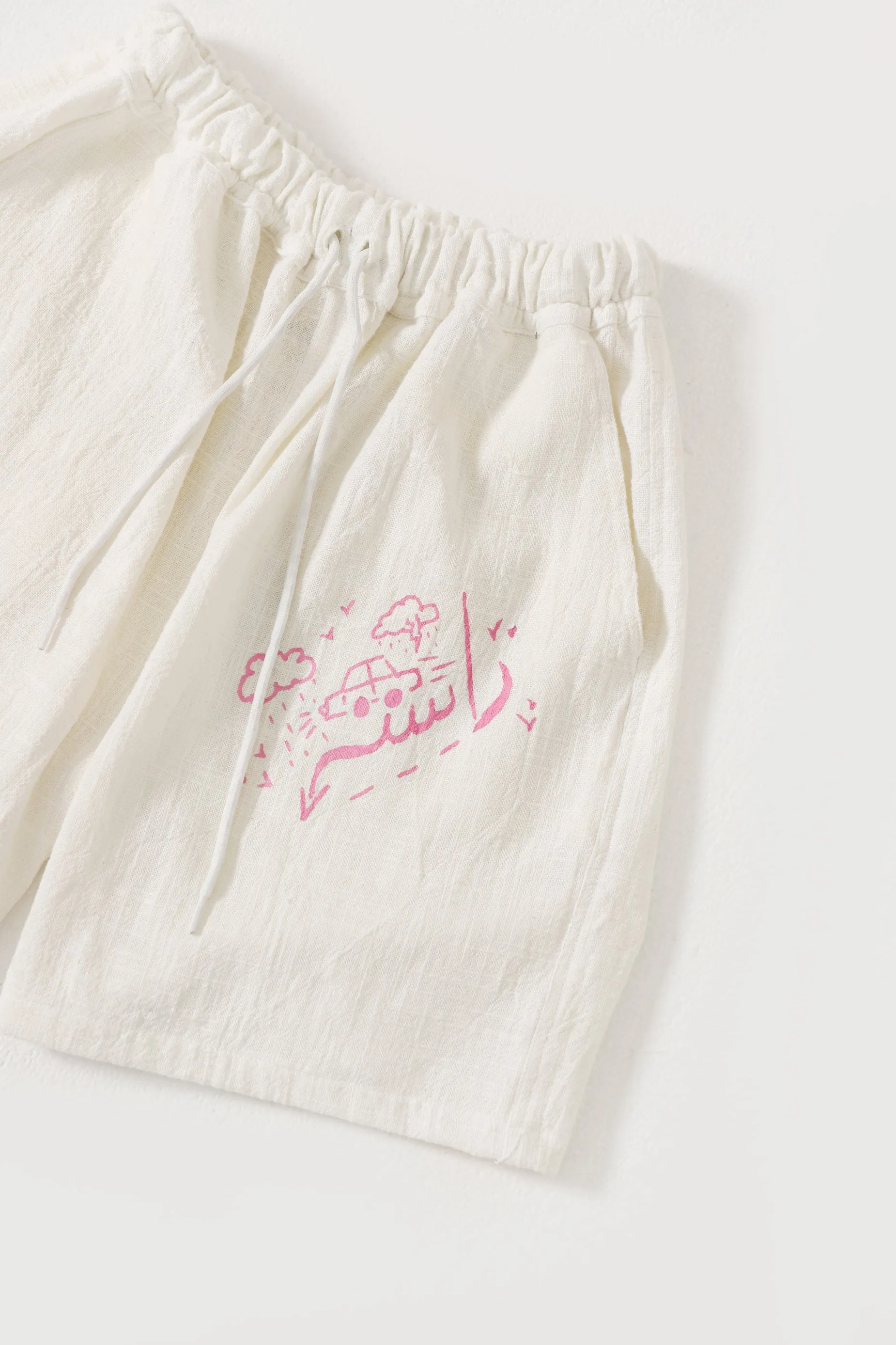 handwoven pink logo shorts