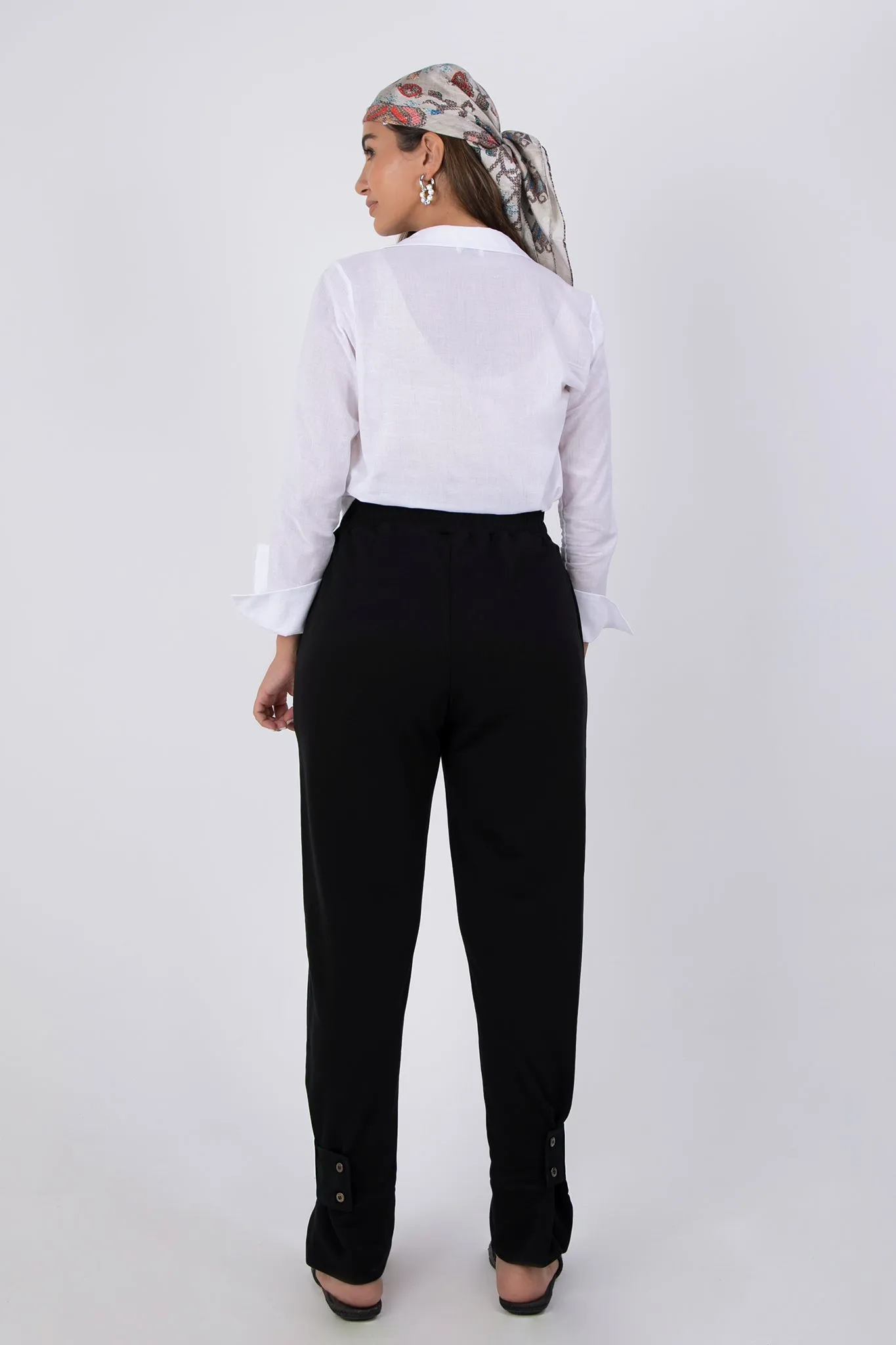 Relaxed cotton track pants with detachable tab cuffs in black